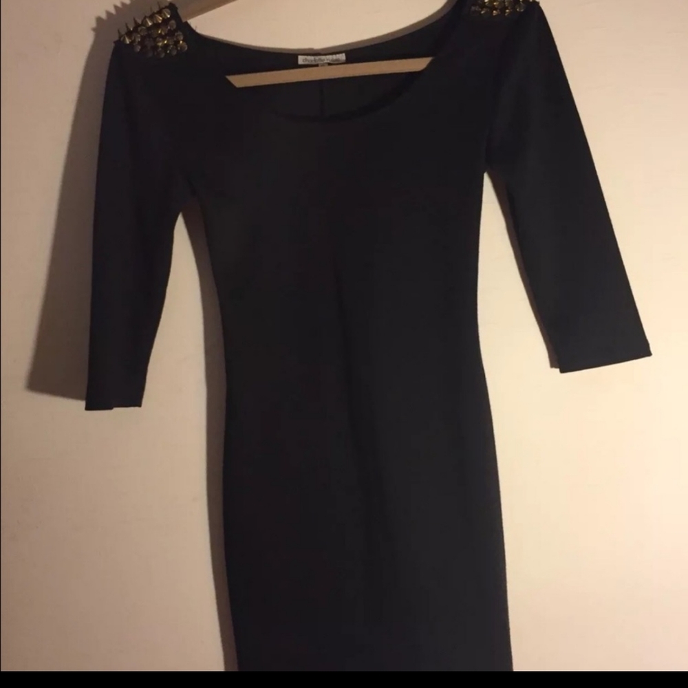 Little black dress w/ spike shoulders